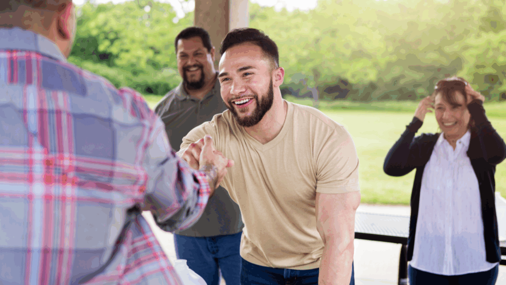 Man shaking hands with another person